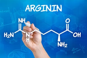 Hand draws chemical structural formula of arginine
