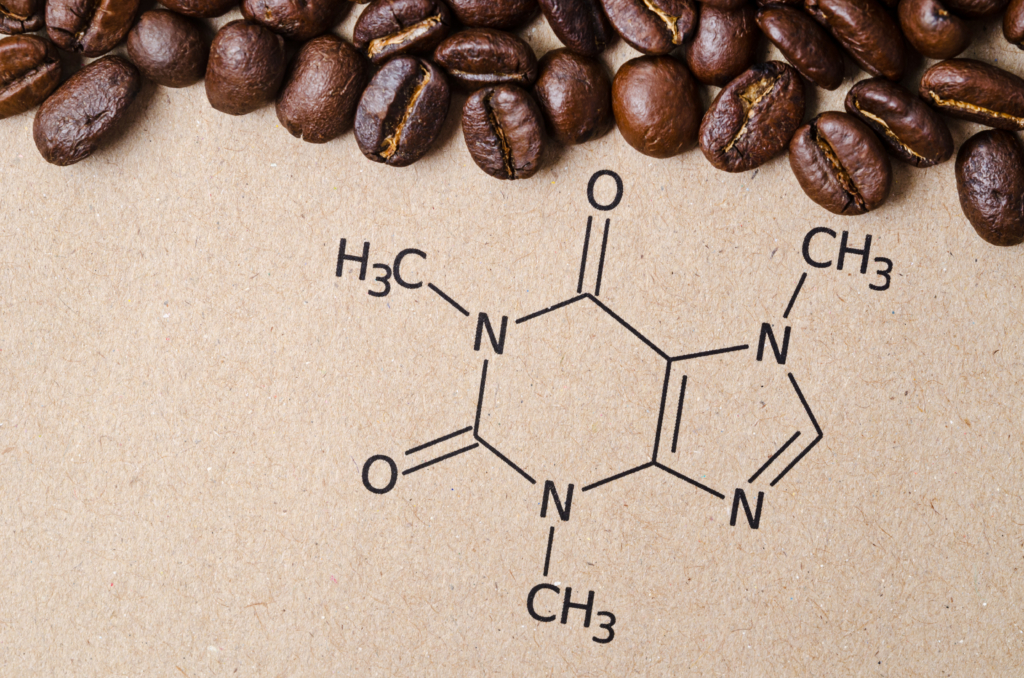 Structural chemical formula of caffeine molecule with roasted coffee beans.